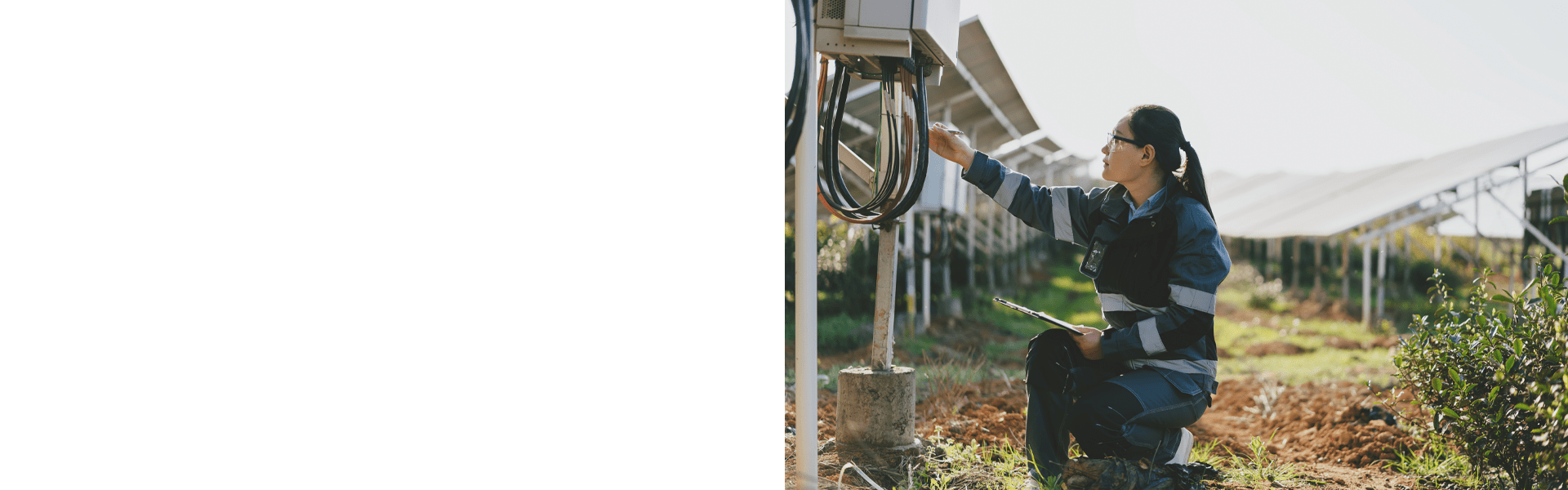 Technician working on energy infrastructure in outdoor field