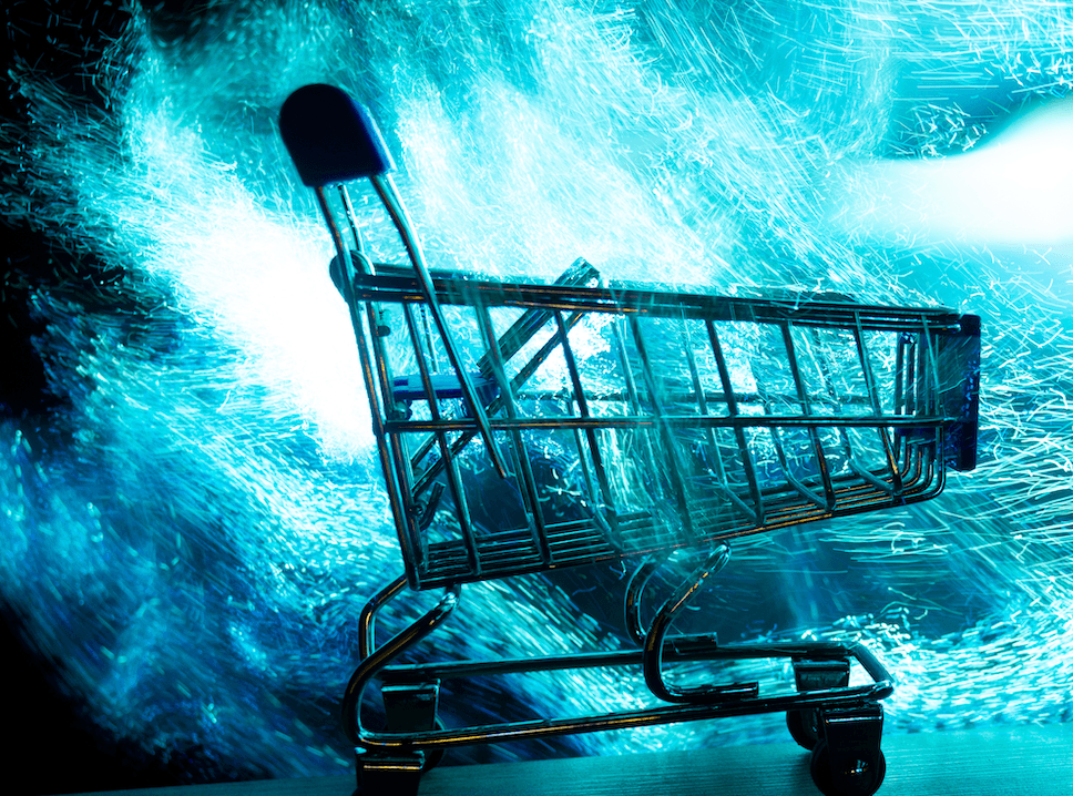 A supermarket shopping cart sits in silhouette before a bright blue swirling storm.