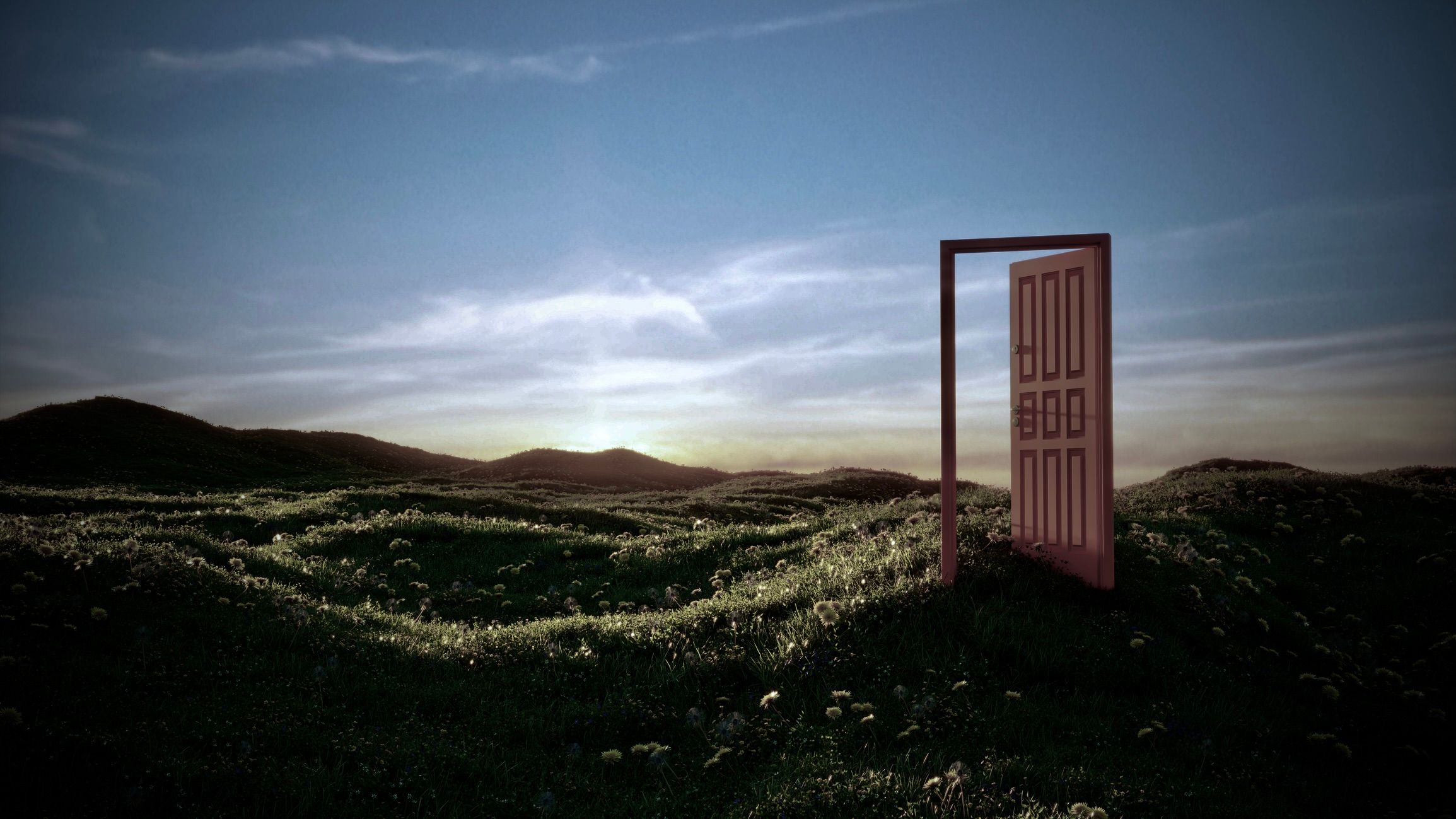 Una foto de una puerta abierta solitaria en medio de colinas onduladas.